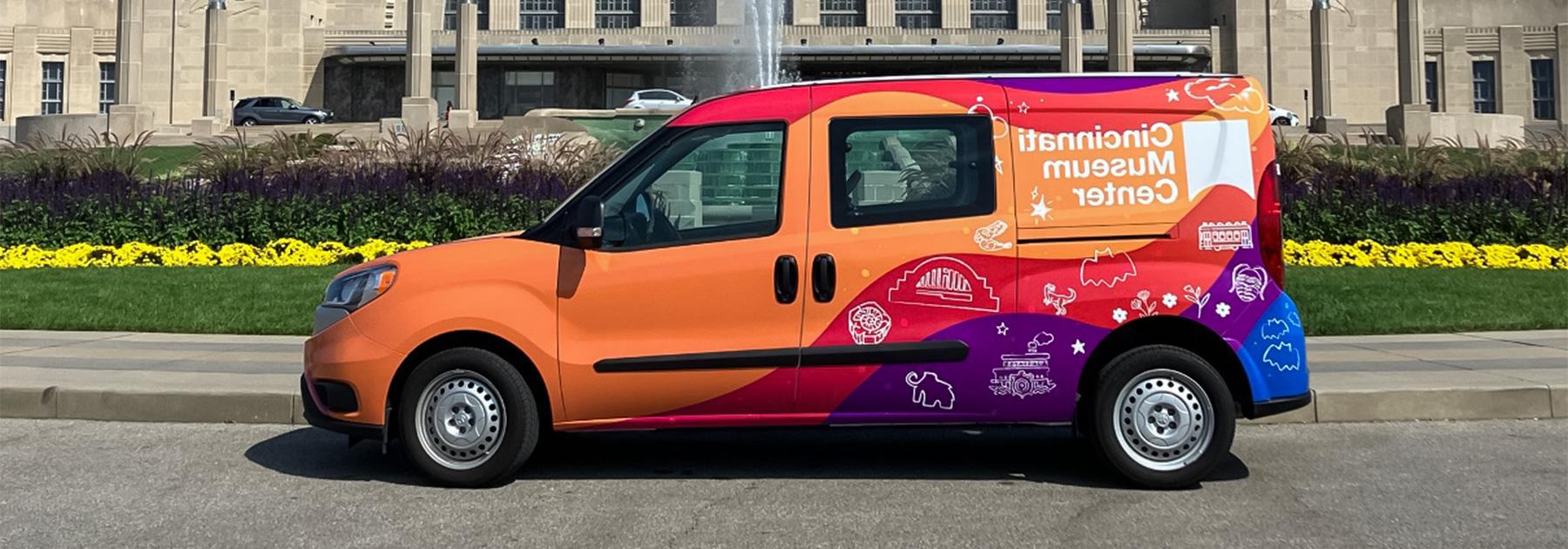 photo of the CMC wrapped vehicle in front of the fountain at Union Terminal